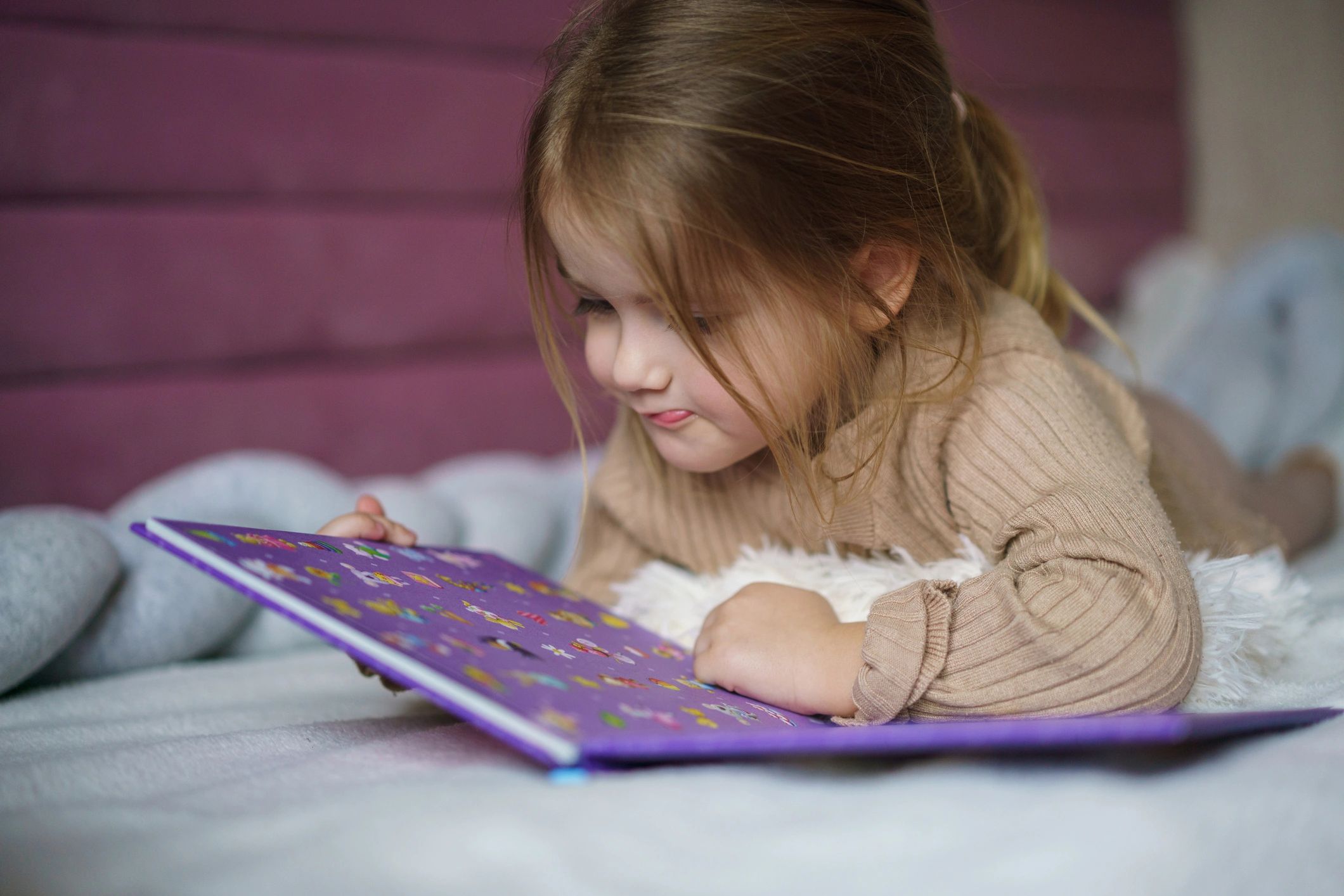 Girl relaxing with a picture book