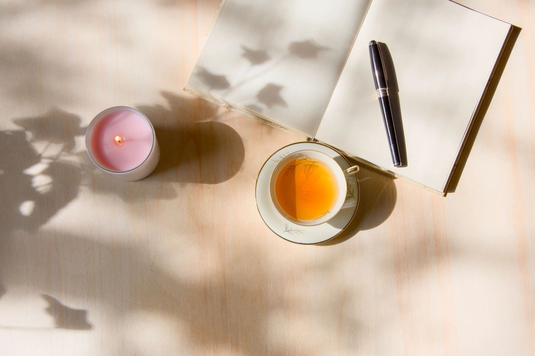 Journal and tea in warm light